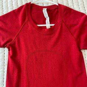 RED SWIFTLY TECH SHORT SLEEVE SIZE 2